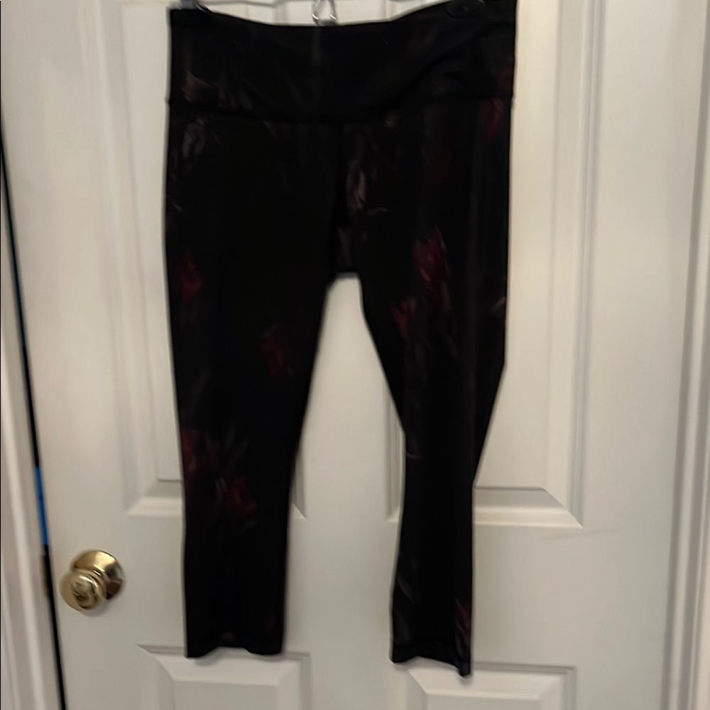 EUC! Lululemon Black Leggings with dark red floral print. Size 8